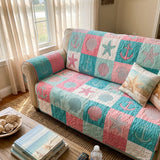 Quilted sofa cover with beach retreat NCU0DV9510