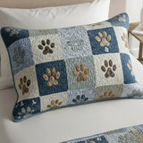 Quilted cushion cover with blue meadow and footprints NCU0NT11676