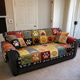 Quilted sofa cover with paw prints NCU0TV871