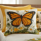 Quilted cushion cover with monarch butterfly on the meadow