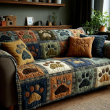 Quilted sofa cover with paw prints NCU0VT338