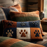 Quilted cushion cover with meadow and footprints